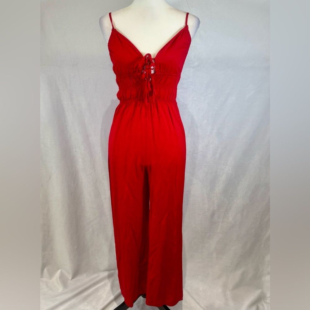 Francesca’s Miami red tie front smocked vneck jumpsuit size small